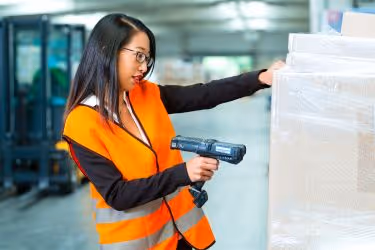 Woman scanning a package
