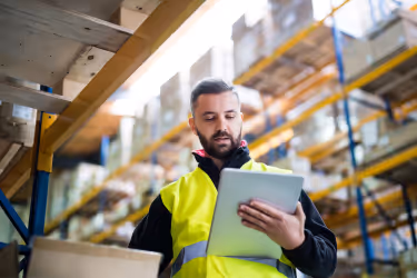 Warehouse worker with a tablet