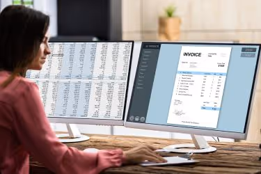 Woman creating invoices