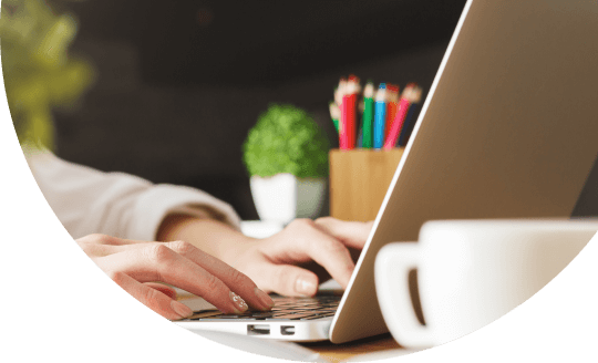 image of typing on laptop