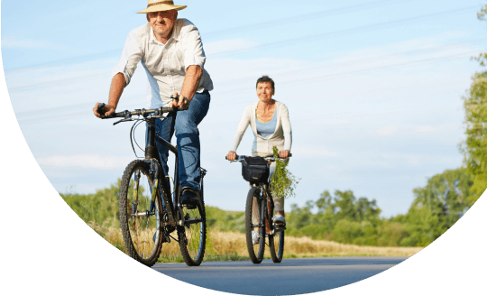 image of couple biking