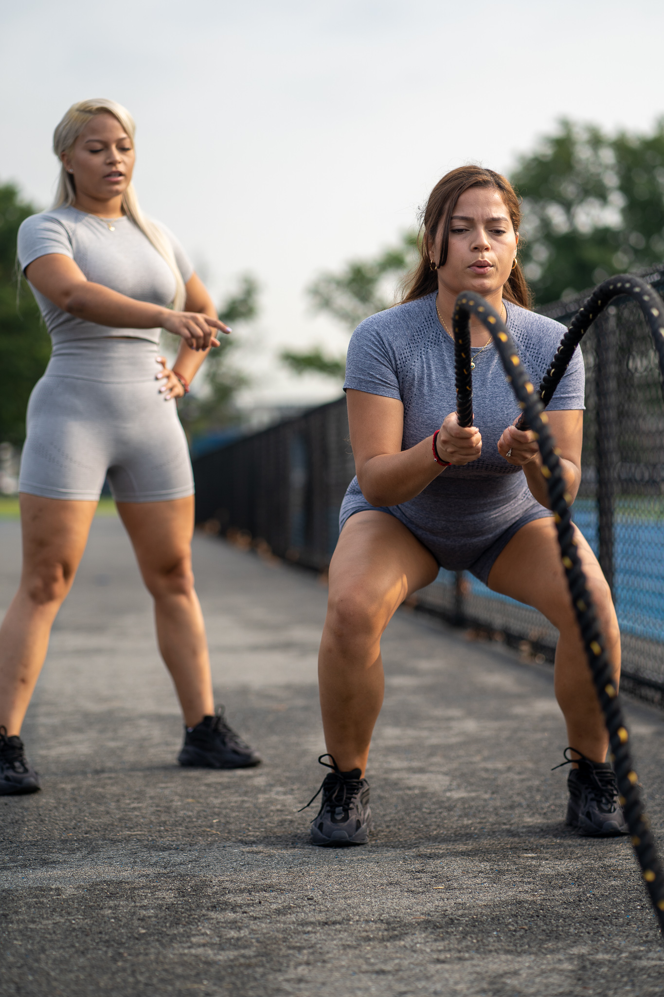 female trainer directing client for photoshoot