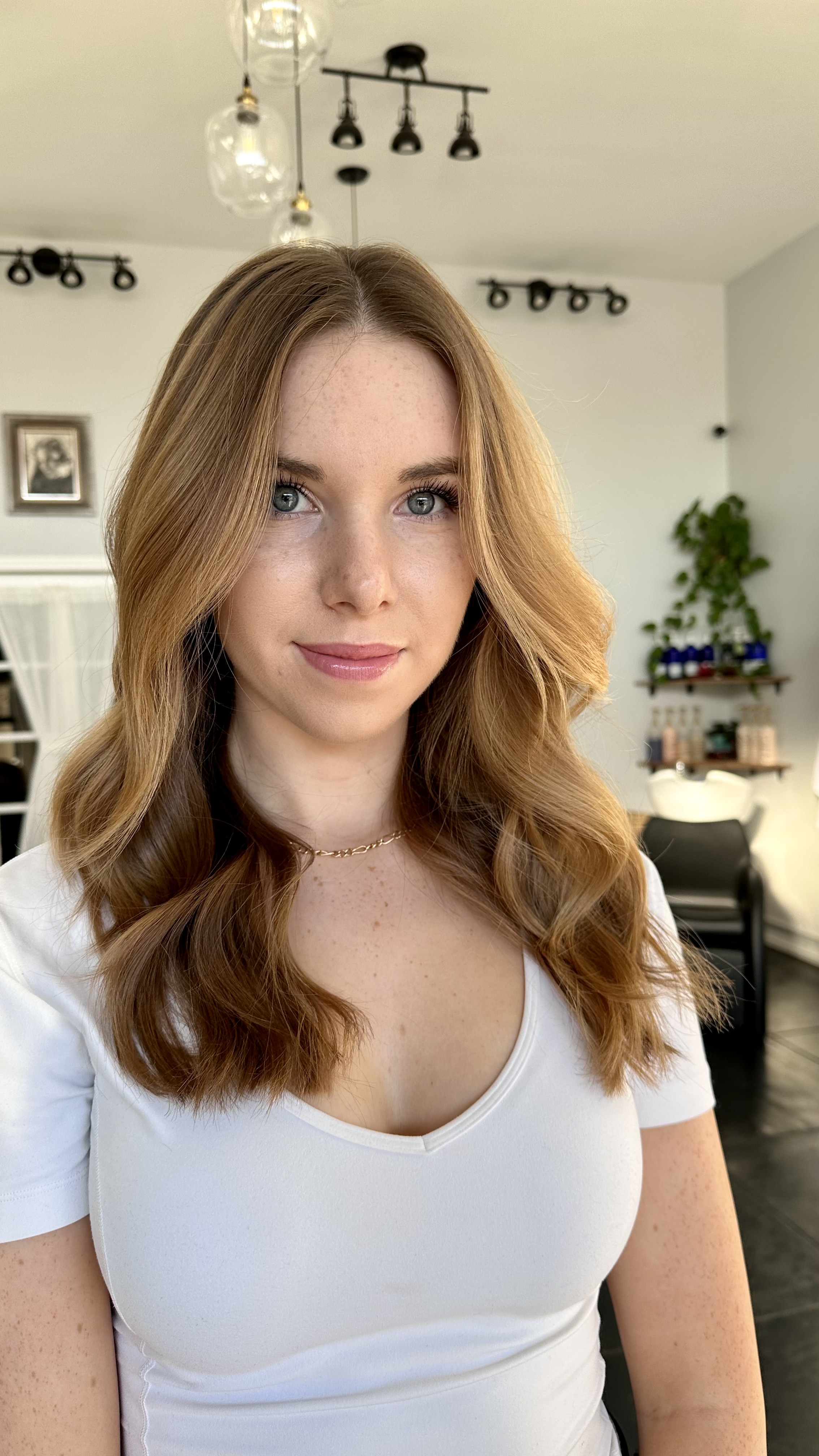 A simple hair cut can really bring out your hair color. Style by Sophie Davies.