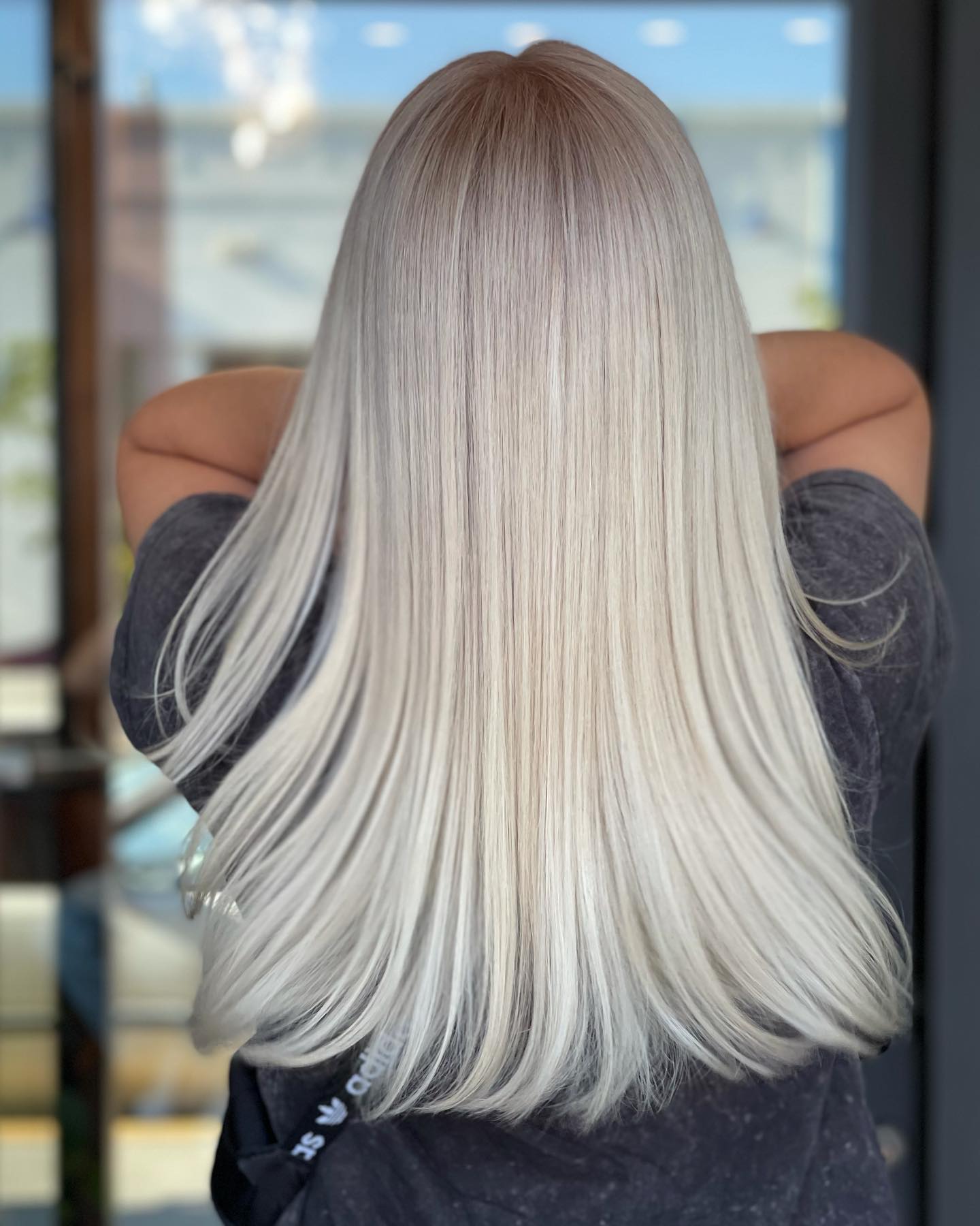 Platinum long hair color correction