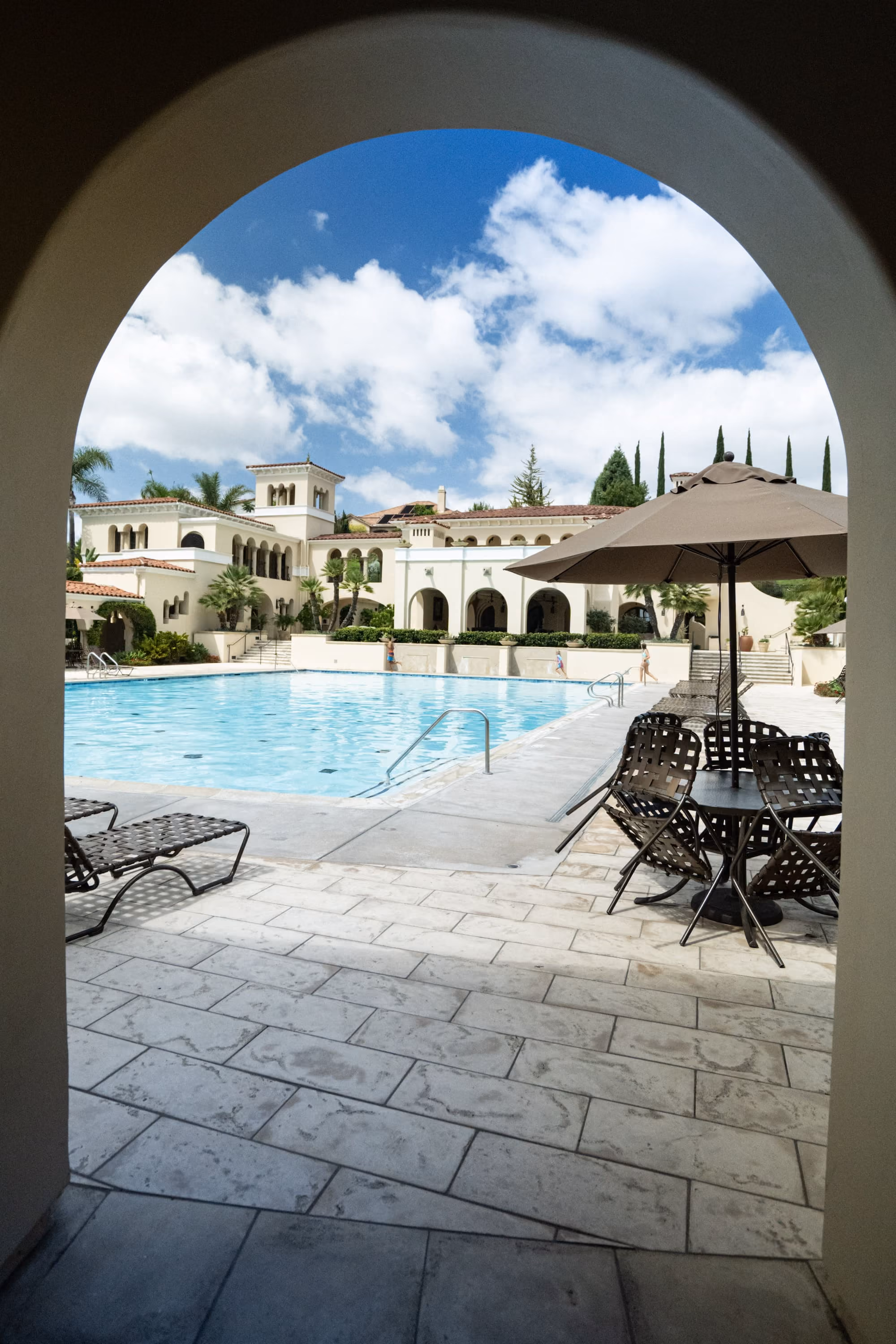 pool seen through an arch opening