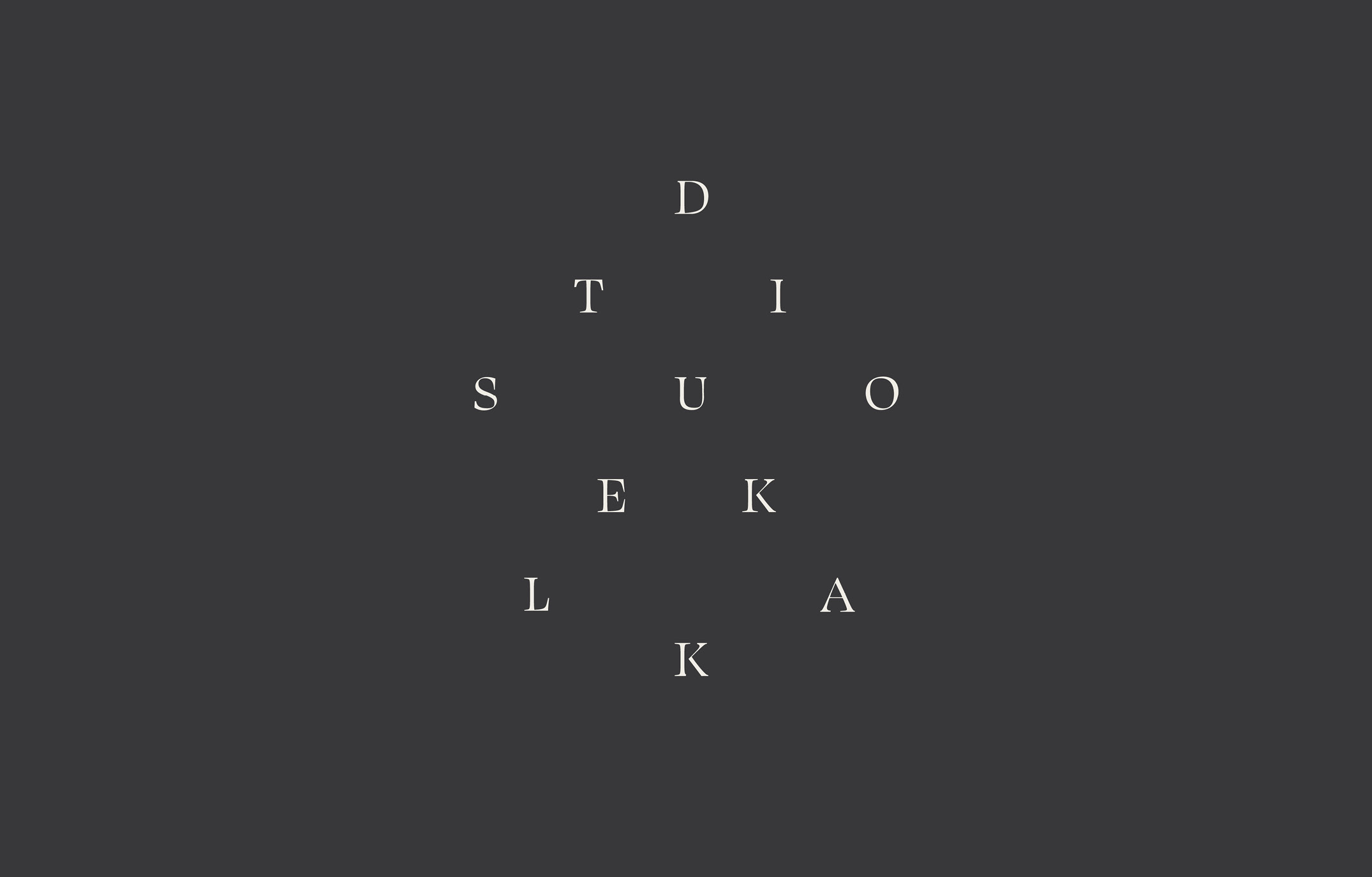 The final Studio Lekka wordmark, cream on charcoal, drawn from a modified Swear Display.