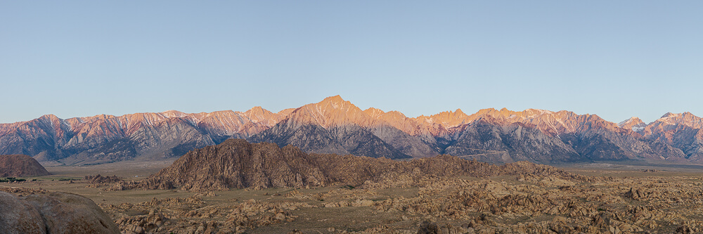 A panoramic photo of the Alabama Hills and Sierra Nevada Mountains 