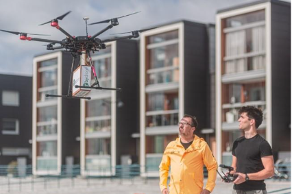 Two people flying a droneAI-generated content may be incorrect.