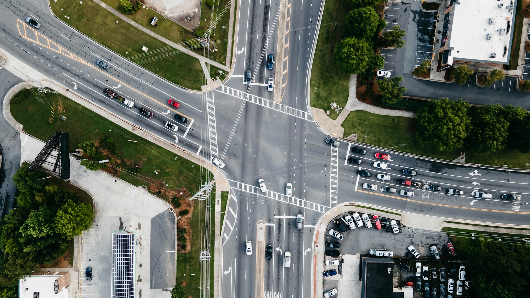 City intersection with traffic seen from above