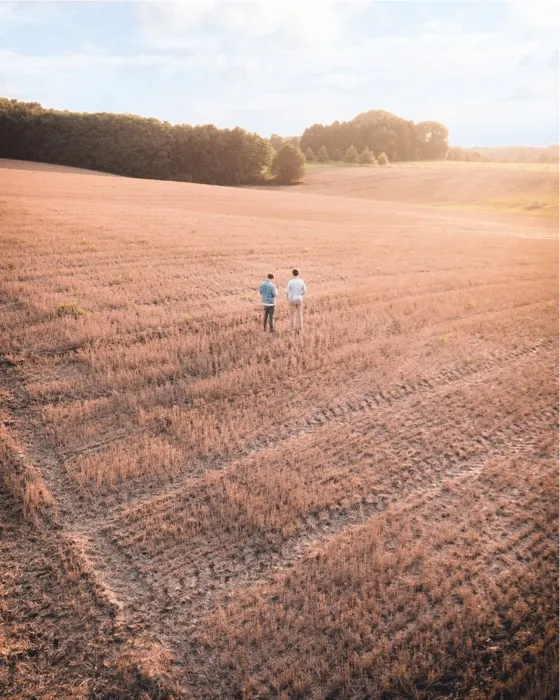 farmers talking in field