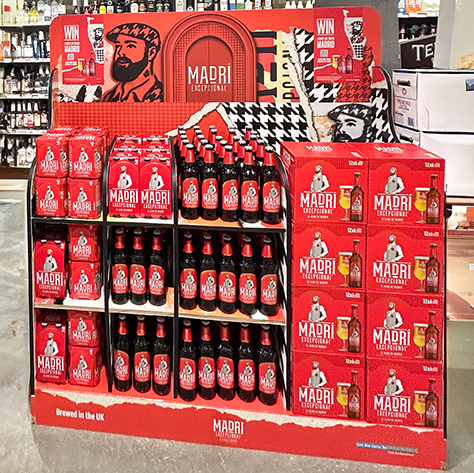 a red point of sale display for Madri Excepional