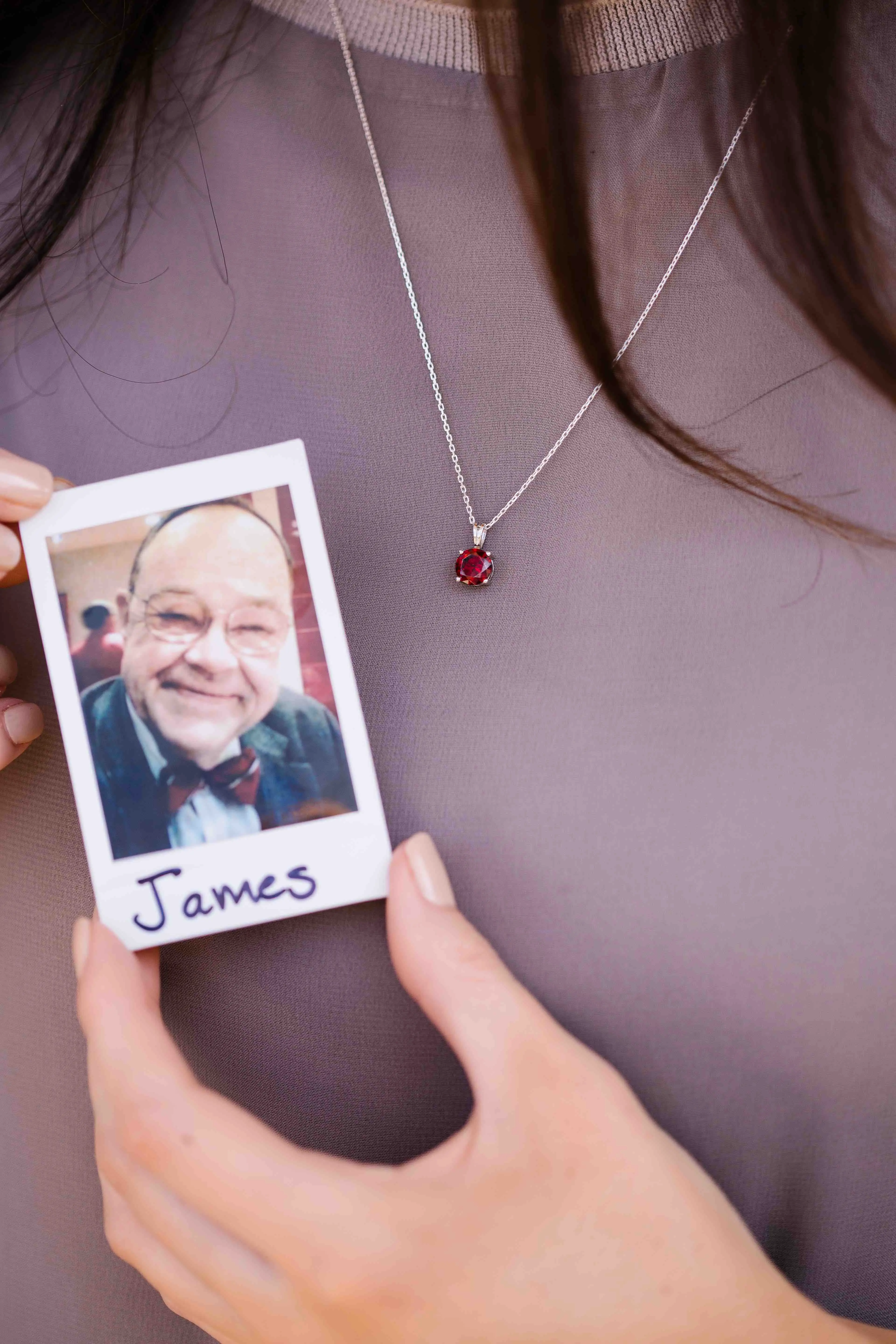 red diamond pendant with photo of a loved one