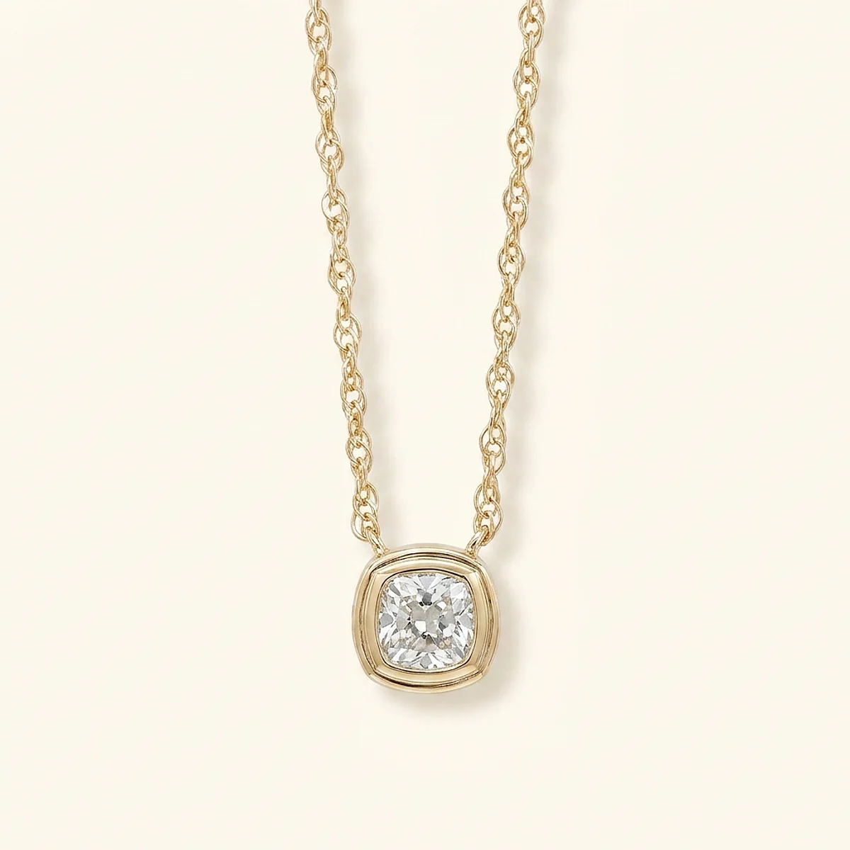 A .4ct colorless cushion diamond on a yellow gold pendant, custom-designed by Eterneva to honor the remarkable Maximus.