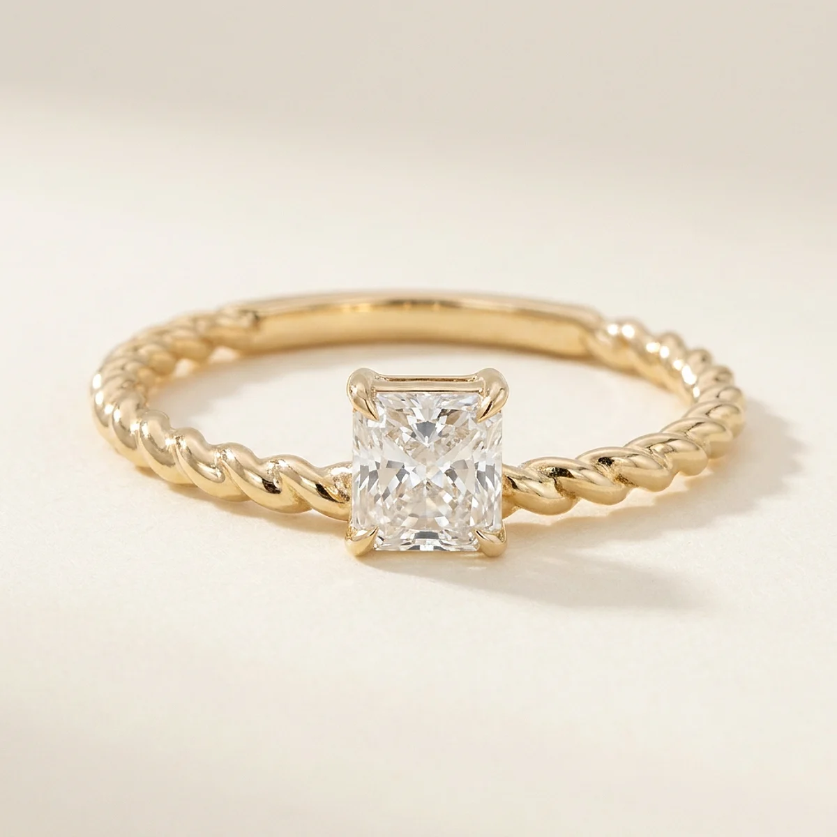 A .4ct colorless square radiant diamond on a yellow gold ring, custom-designed by Eterneva to honor the remarkable Jackson.