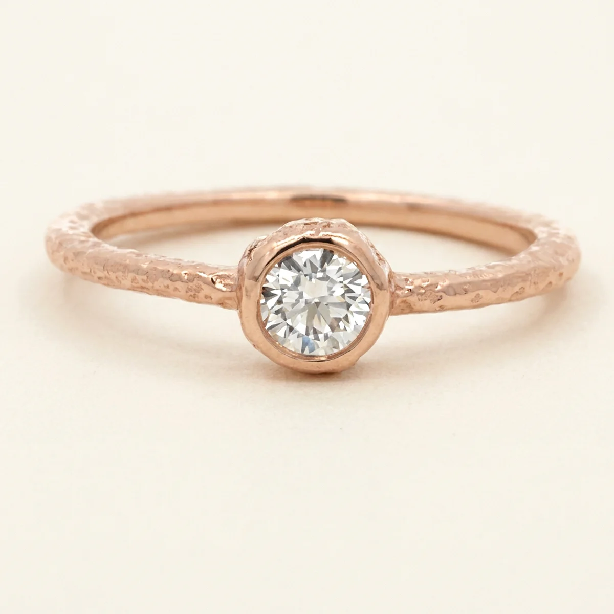 A .25ct colorless round diamond on a rose gold ring, custom-designed by Eterneva to honor the remarkable Archer.