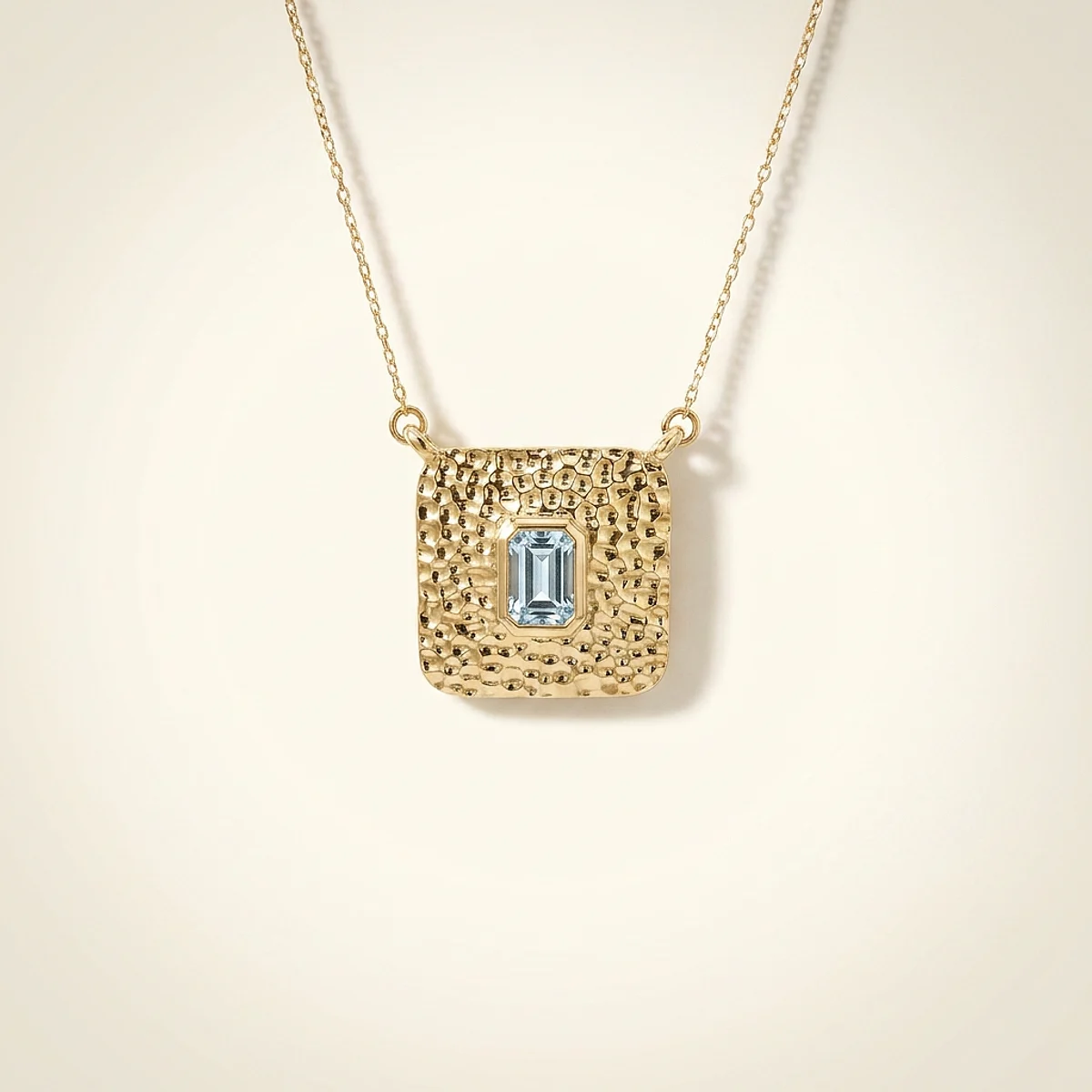 A .75ct blue emerald diamond on a yellow gold necklace, custom-designed by Eterneva to honor the remarkable Bailey.