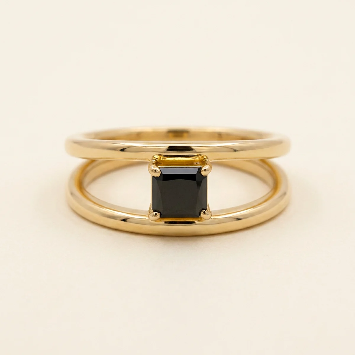 A .4ct black radiant diamond on a yellow gold ring, custom-designed by Eterneva to honor the remarkable Maggie.