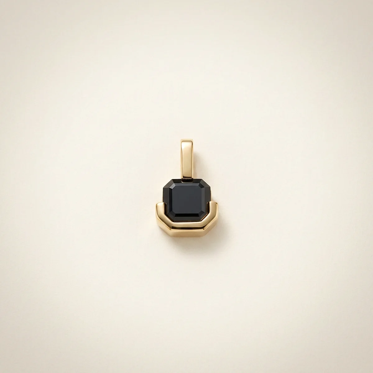 A .5ct black asscher diamond on a yellow gold pendant, custom-designed by Eterneva to honor the remarkable Revy.