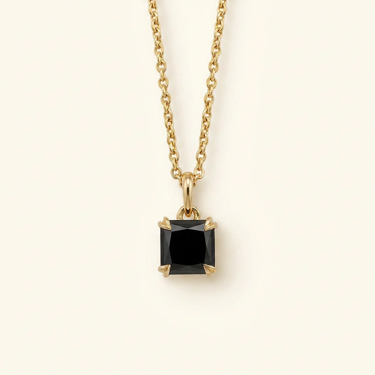 A .4ct black rectangular radiant diamond on a yellow gold necklace, custom-designed by Eterneva to honor the remarkable Edwin.