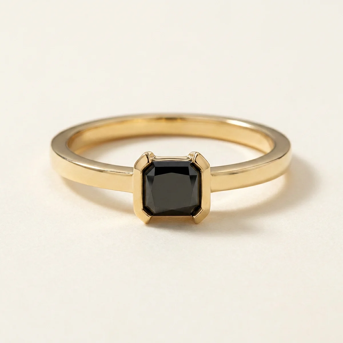 A .5ct black rectangular radiant diamond on a yellow gold ring, custom-designed by Eterneva to honor the remarkable Matt.
