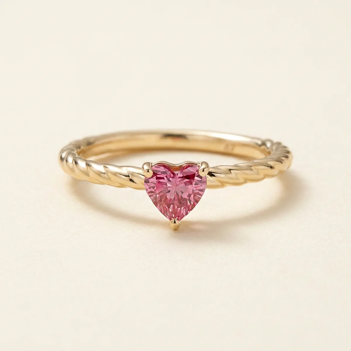 A .25ct pink heart diamond on a yellow gold ring, custom-designed by Eterneva to honor the remarkable Sandra.