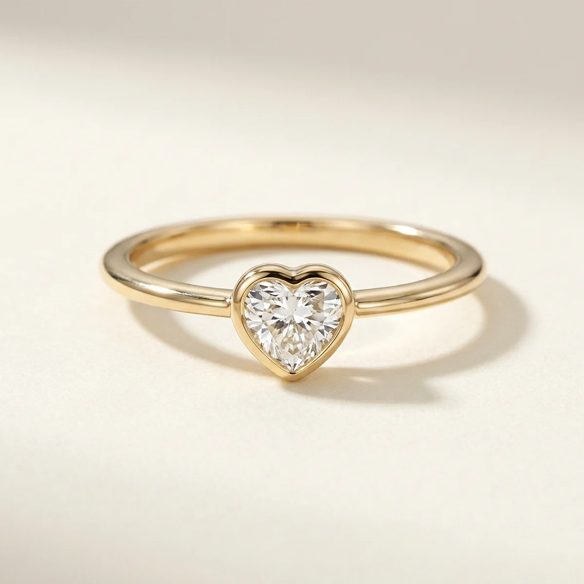 A .25ct colorless heart diamond on a yellow gold ring, custom-designed by Eterneva to honor the remarkable Quinton.