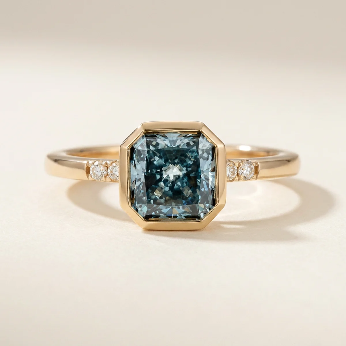 A 1.5ct blue square radiant diamond on a yellow gold ring, custom-designed by Eterneva to honor the remarkable Dalton.