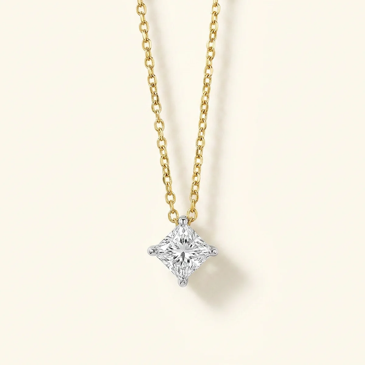 A .5ct colorless square radiant diamond on a white gold necklace, custom-designed by Eterneva to honor the remarkable Athena.