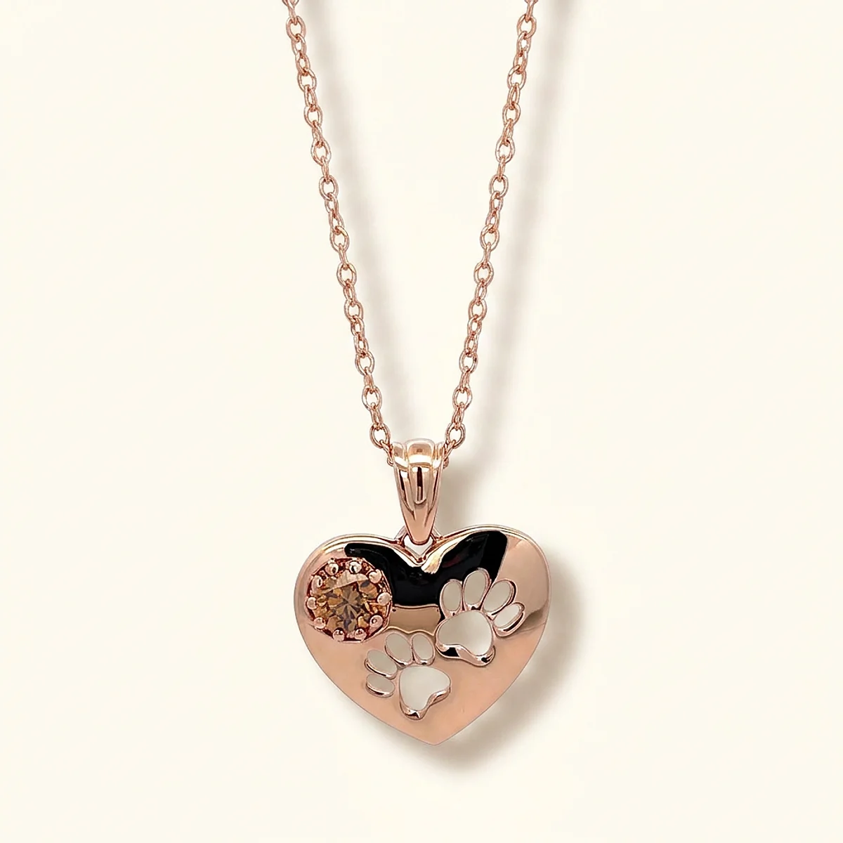 A .4ct champagne round diamond on a rose gold necklace, custom-designed by Eterneva to honor the remarkable Fynn.