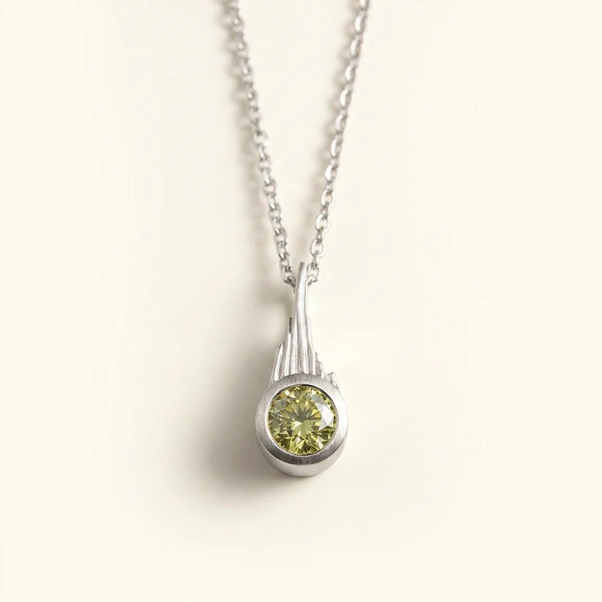 A .75ct green round diamond on a white gold pendant, custom-designed by Eterneva to honor the remarkable John.