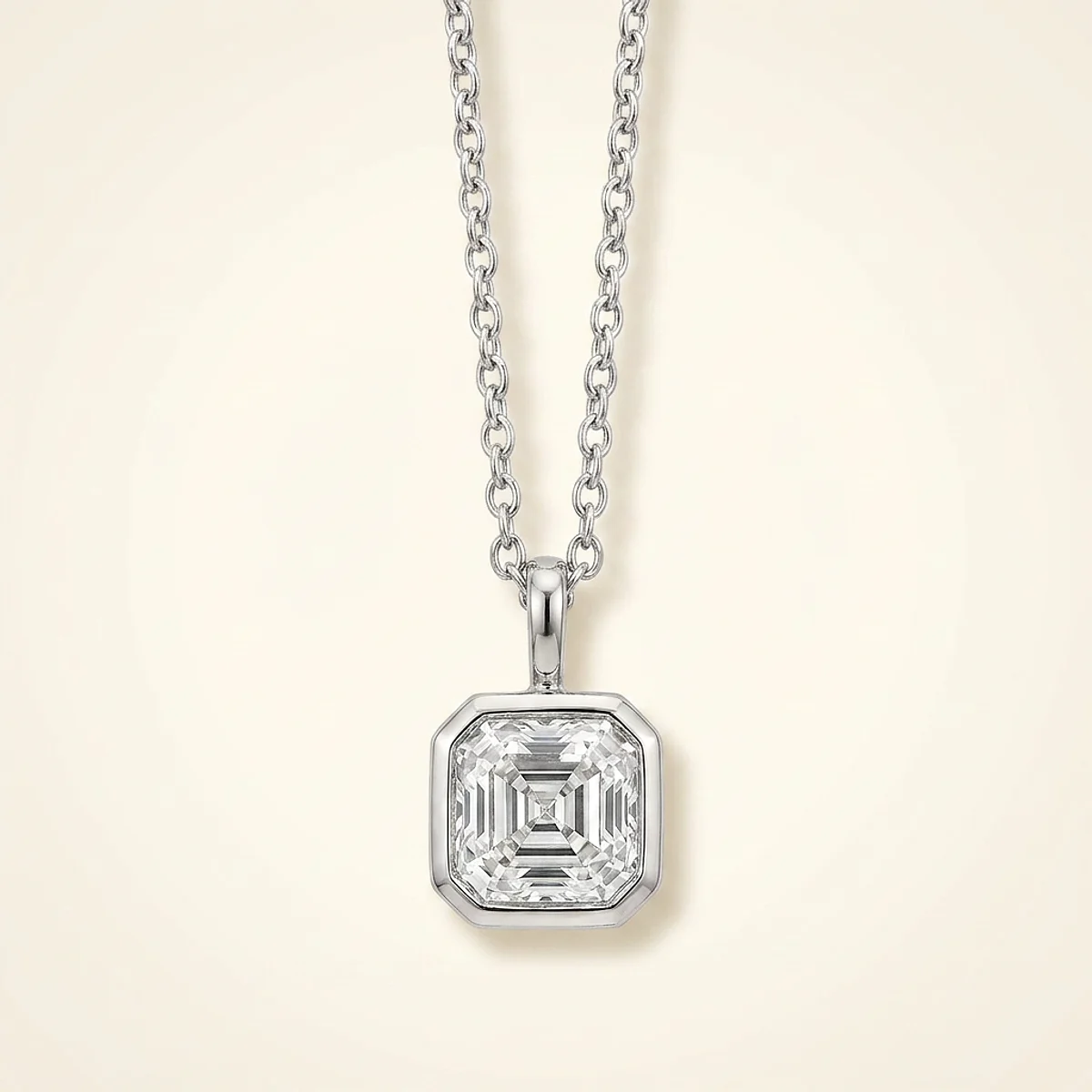 A 1ct colorless asscher diamond on a white gold necklace, custom-designed by Eterneva to honor the remarkable Crackerjack.