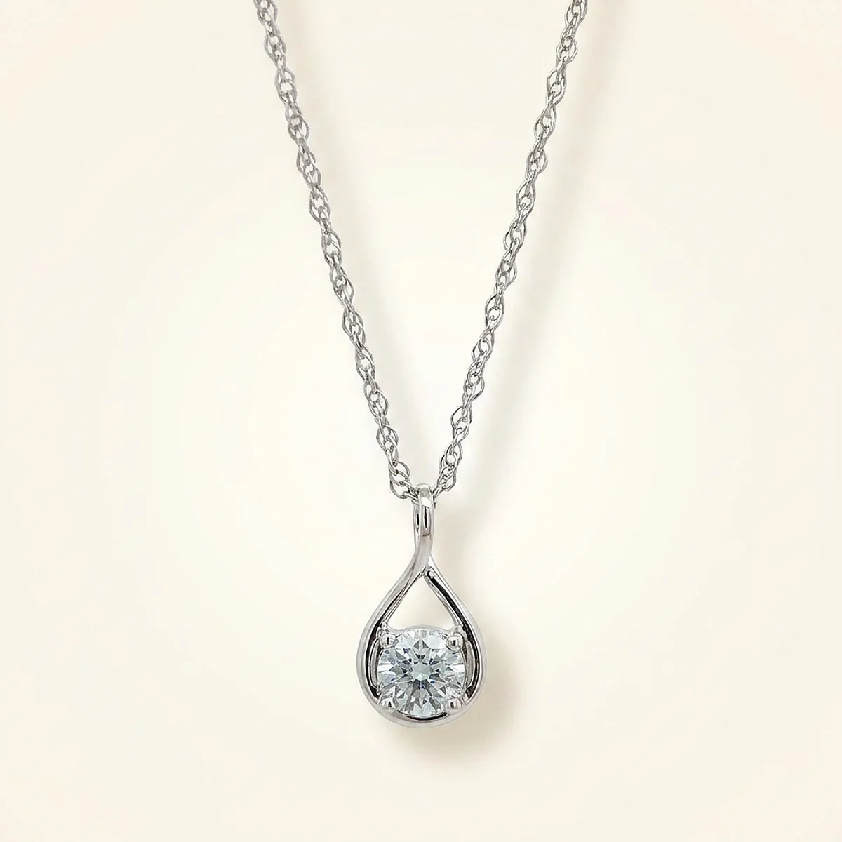 A .5ct blue round diamond on a white gold pendant, custom-designed by Eterneva to honor the remarkable Julian.