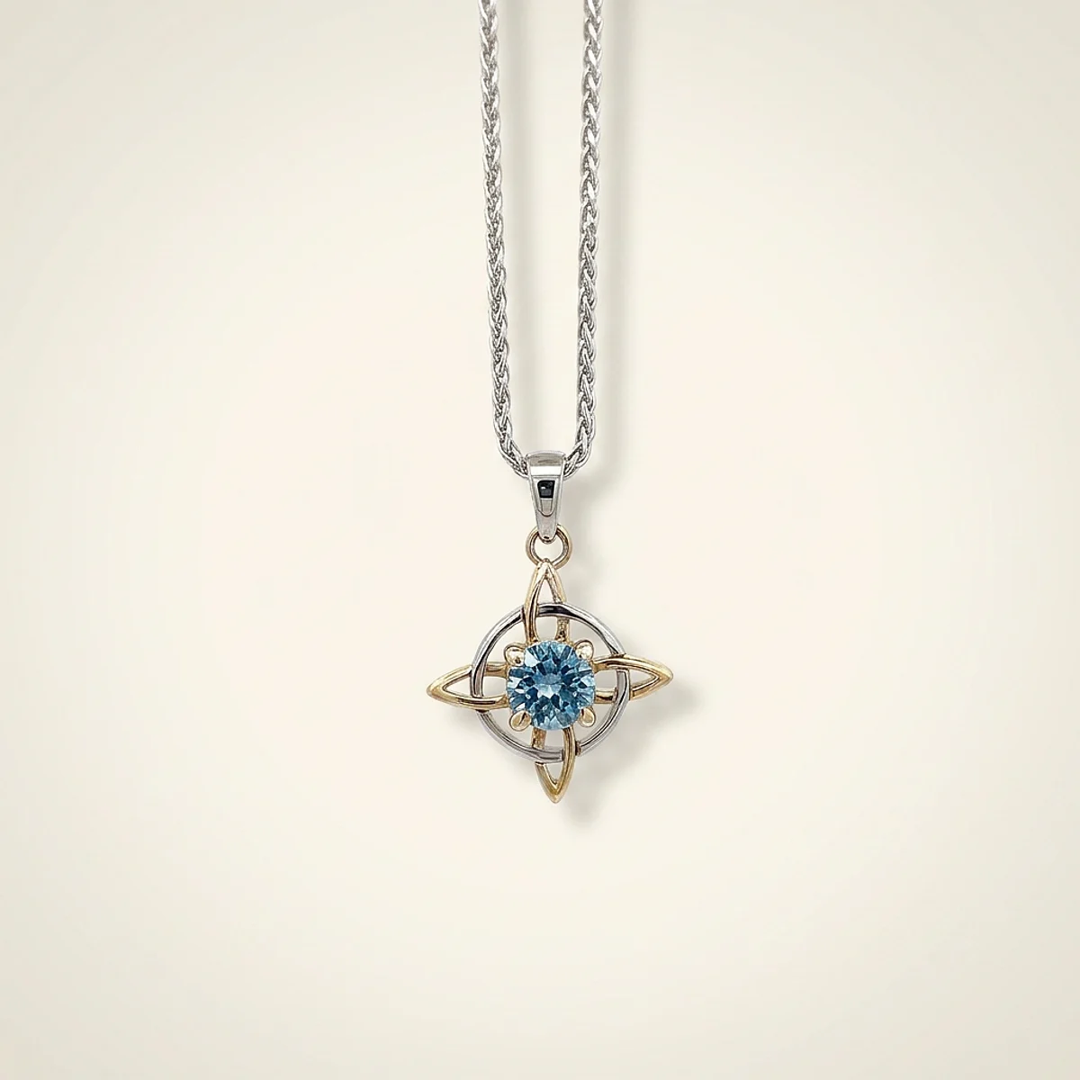 A .4ct blue round diamond on a mixed metal pendant, custom-designed by Eterneva to honor the remarkable Erica.