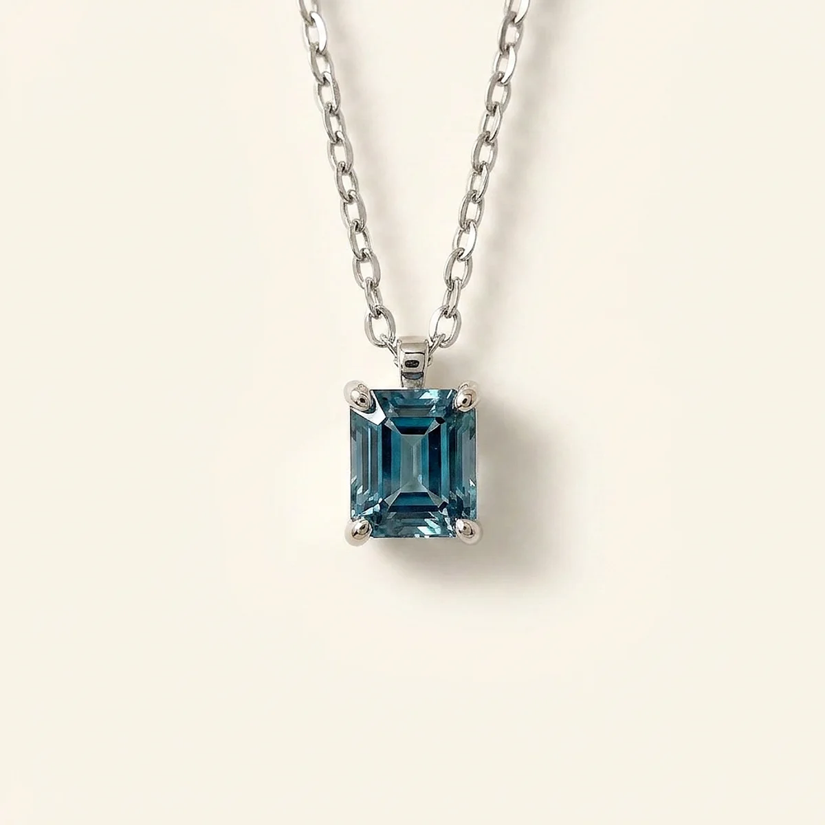 A .5ct blue rectangular radiant diamond on a white gold necklace, custom-designed by Eterneva to honor the remarkable Mitch.