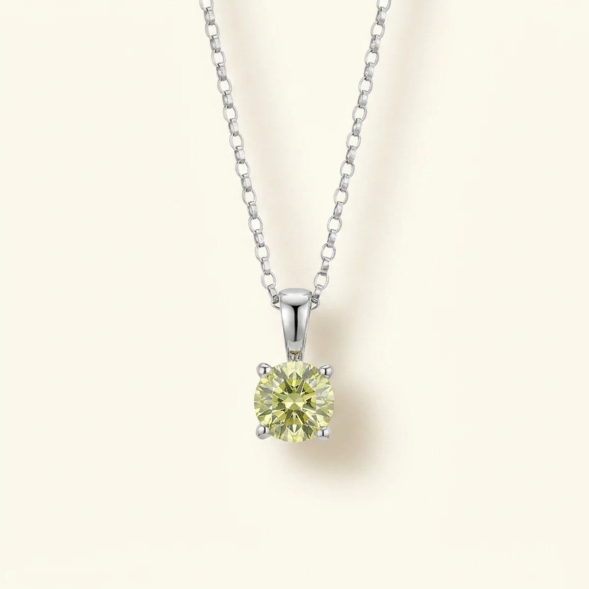 A .5ct green round diamond on a white gold pendant, custom-designed by Eterneva to honor the remarkable Madelon.