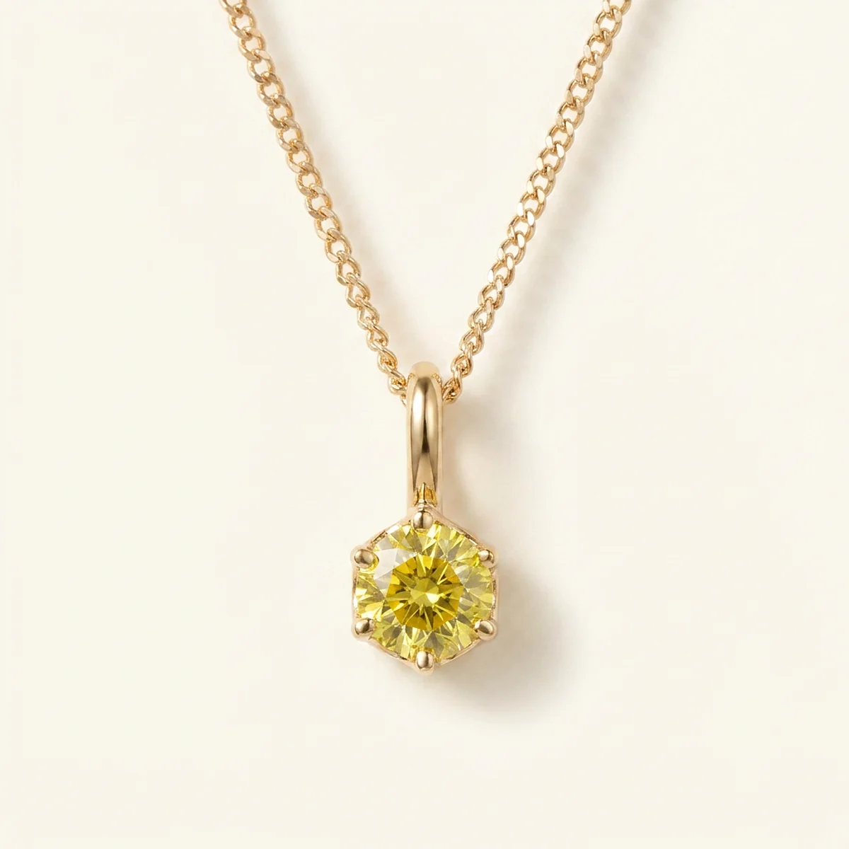 A .25ct yellow round diamond on a yellow gold pendant, custom-designed by Eterneva to honor the remarkable Chispita.
