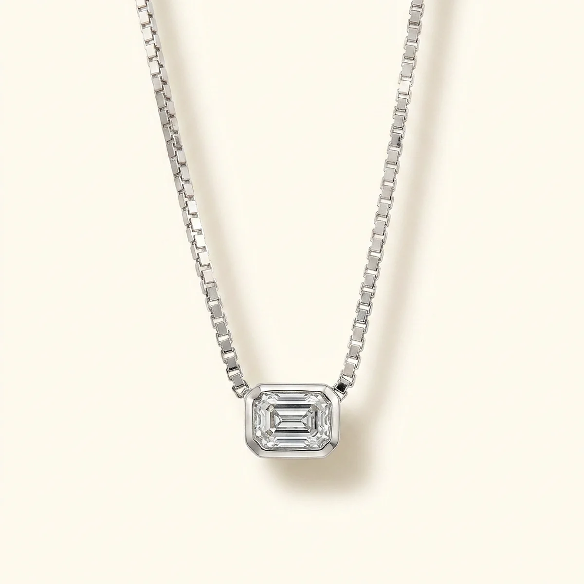 A .5ct colorless emerald diamond on a white gold necklace, custom-designed by Eterneva to honor the remarkable Piper.