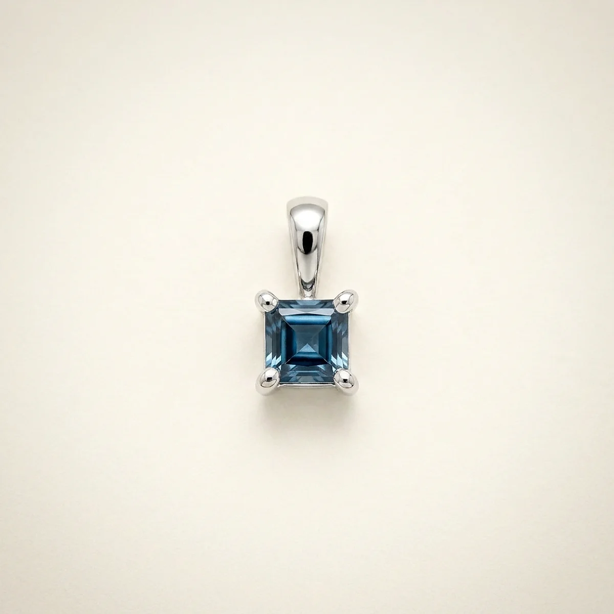 A .4ct blue square asscher diamond on a white gold pendant, custom-designed by Eterneva to honor the remarkable Francisco.
