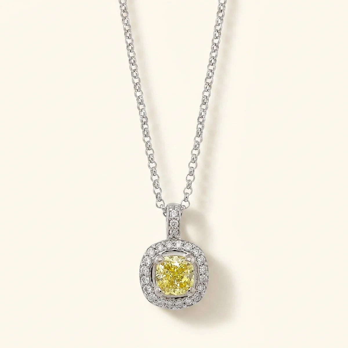 A 1ct yellow cushion diamond on a white gold pendant, custom-designed by Eterneva to honor the remarkable Sherri.