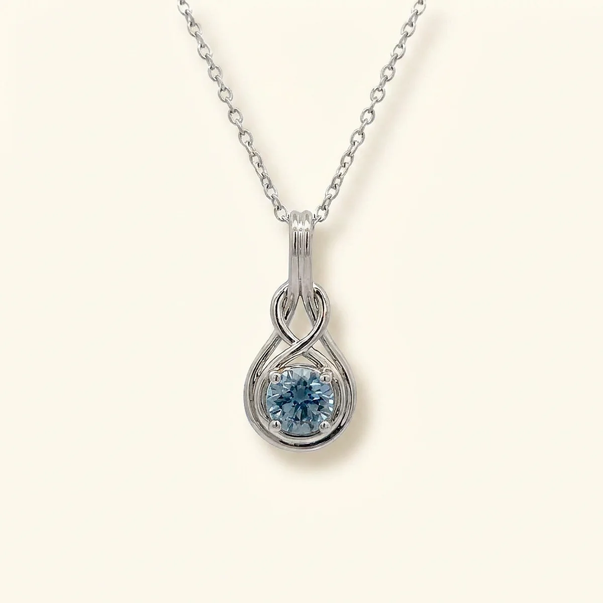 A .5ct blue round diamond on a white gold pendant, custom-designed by Eterneva to honor the remarkable Justin.