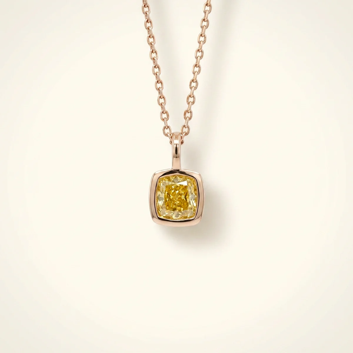 A .4ct yellow cushion diamond on a yellow gold pendant, custom-designed by Eterneva to honor the remarkable Maurine.