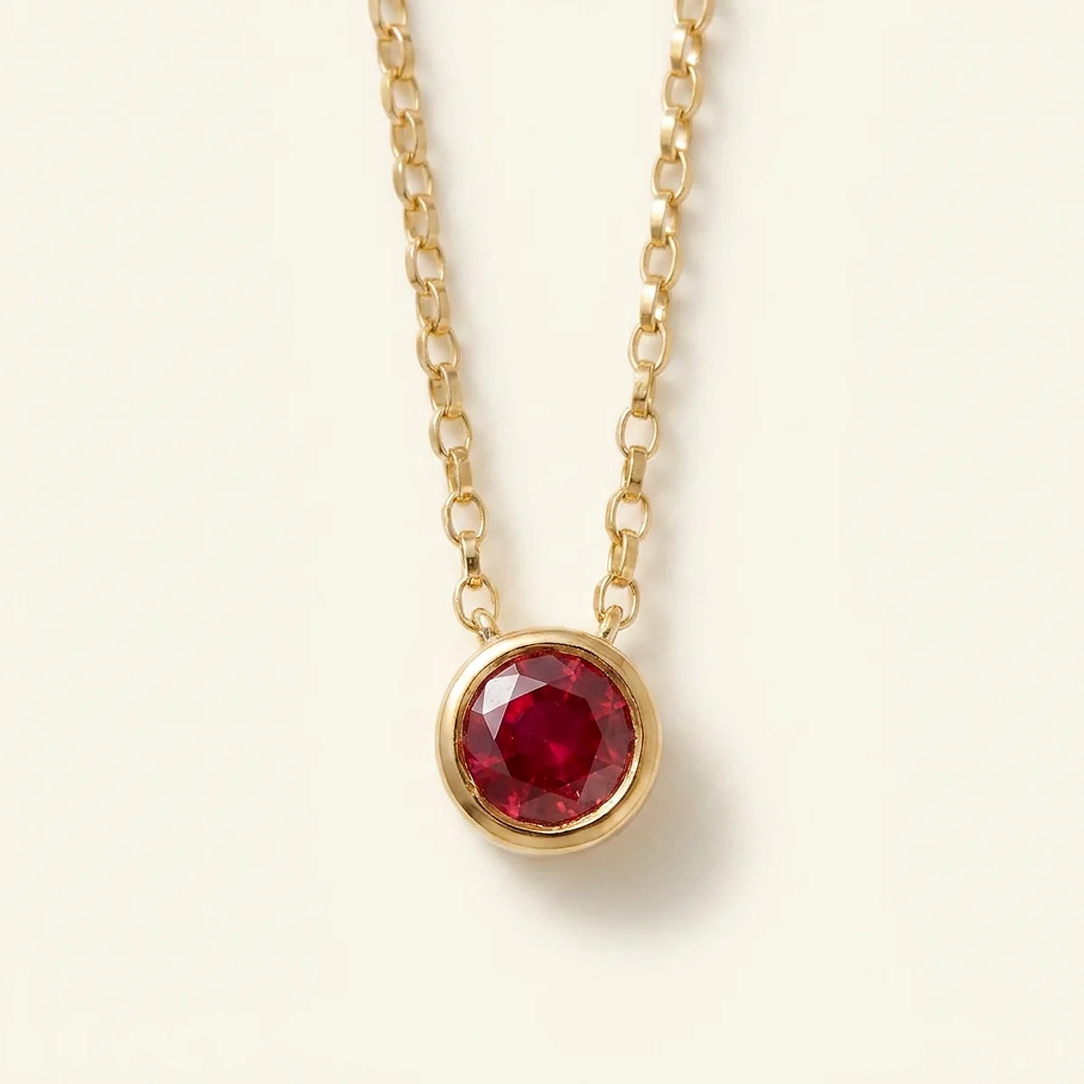 A .25ct red round diamond on a yellow gold pendant, custom-designed by Eterneva to honor the remarkable Scott.