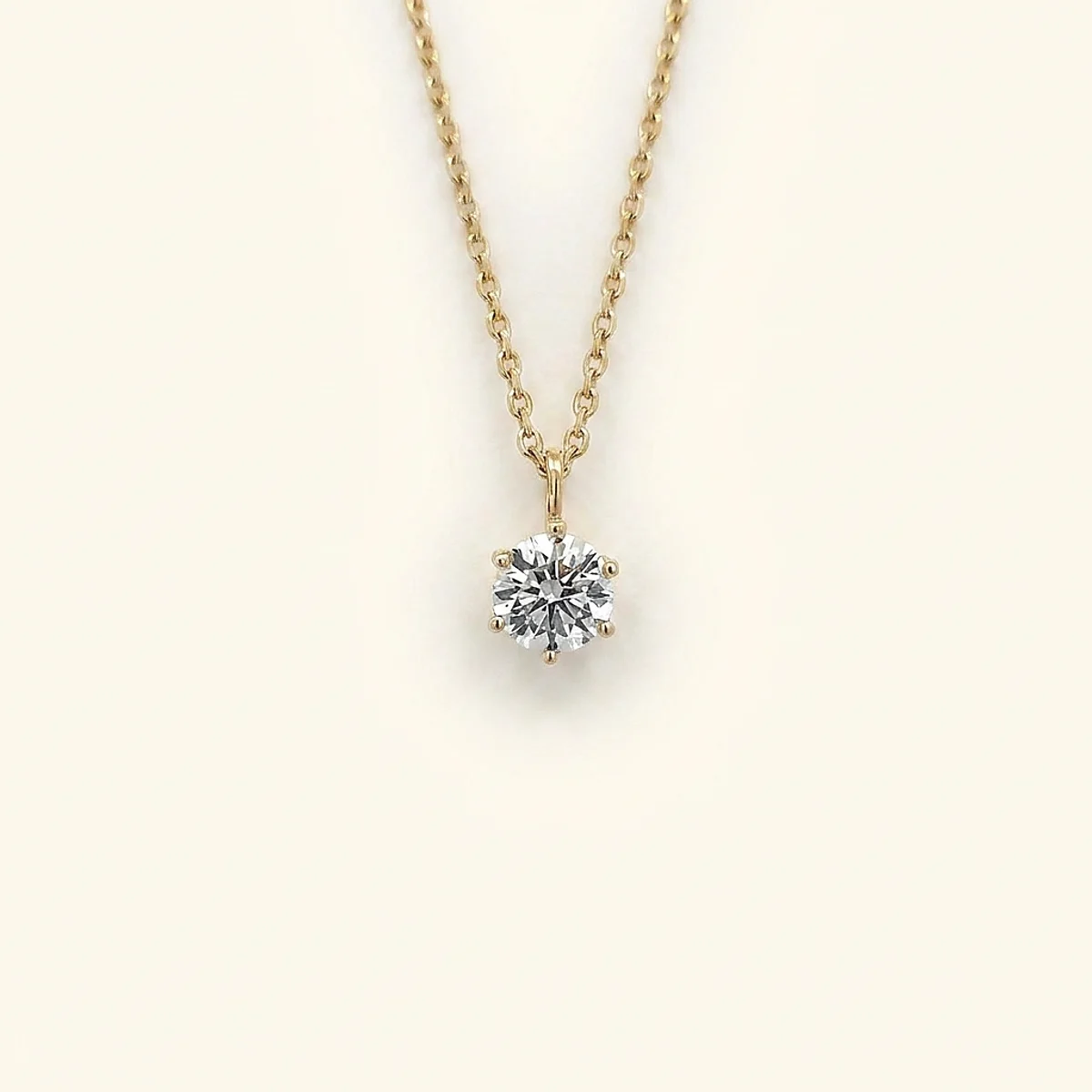 A .5ct colorless round diamond on a yellow gold pendant, custom-designed by Eterneva to honor the remarkable Drake.