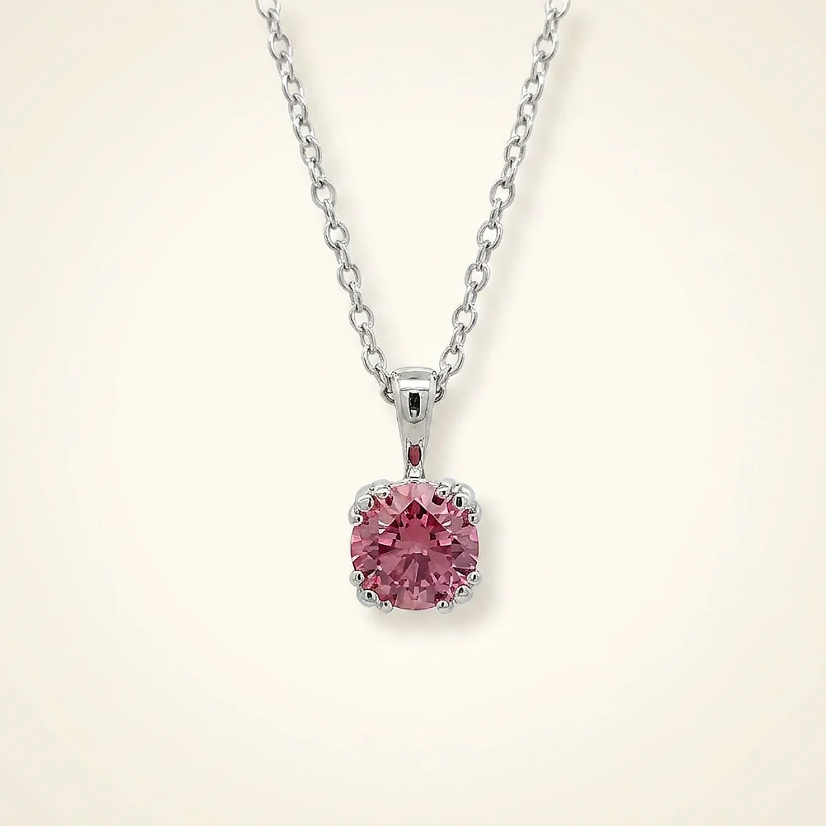 A .5ct pink round diamond on a white gold pendant, custom-designed by Eterneva to honor the remarkable Kitty.