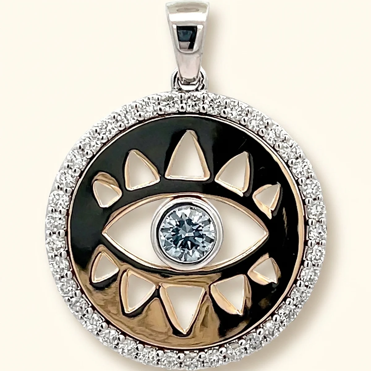 A .25ct blue round diamond on a mixed metal pendant, custom-designed by Eterneva to honor the remarkable Loretta.