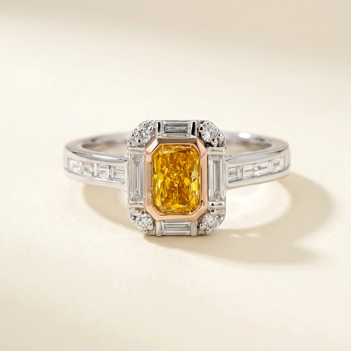 A .5ct yellow rectangular radiant diamond on a mixed metal ring, custom-designed by Eterneva to honor the remarkable Emma.