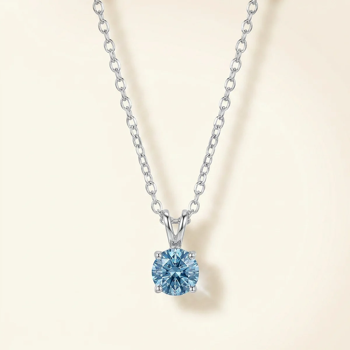 A .25ct blue round diamond on a white gold pendant, custom-designed by Eterneva to honor the remarkable Angelica.