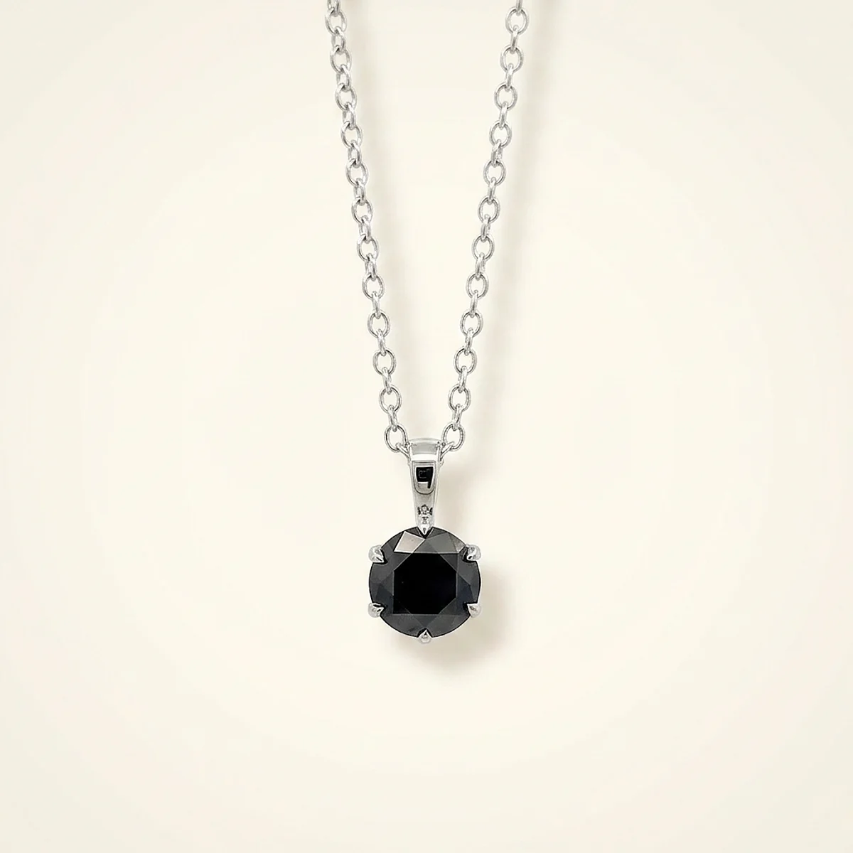 A .5ct black round diamond on a white gold pendant, custom-designed by Eterneva to honor the remarkable Phineas.
