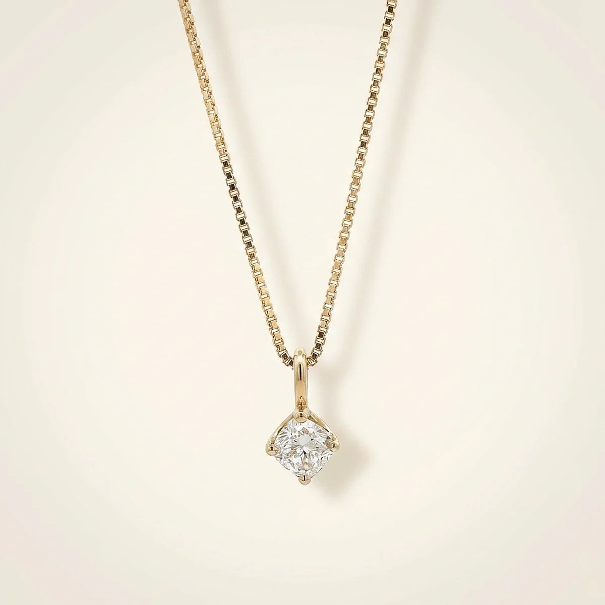 A .75ct colorless cushion diamond on a yellow gold necklace, custom-designed by Eterneva to honor the remarkable Charlie.