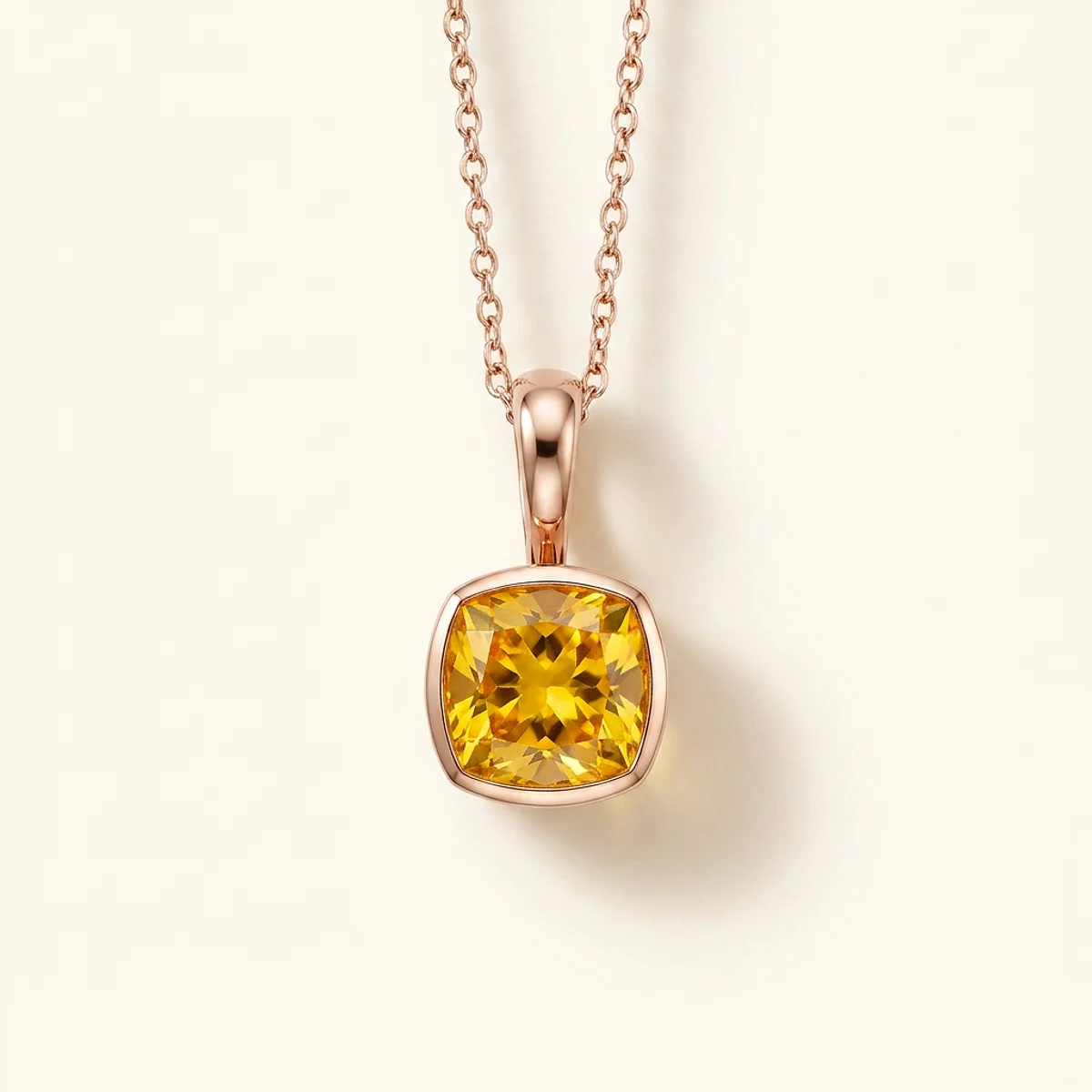 A 1ct yellow cushion diamond on a rose gold pendant, custom-designed by Eterneva to honor the remarkable Michael.